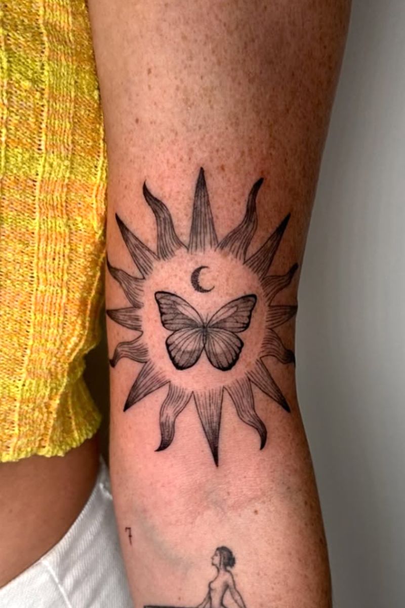 Butterfly within the sun in tattoo art