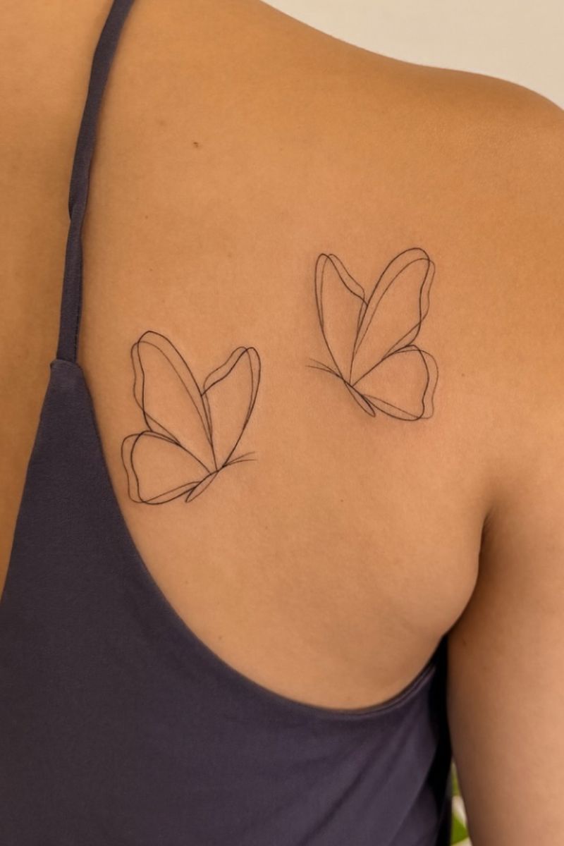 Two double lined, fine line butterflies 