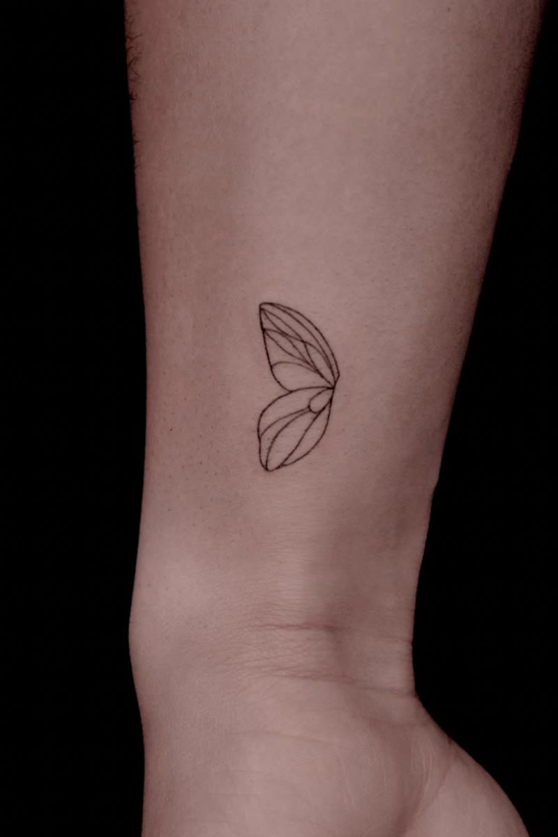 A tattoo of just one butterfly wing