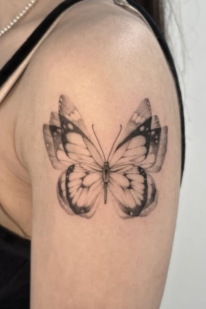 Wings in motion tattoo