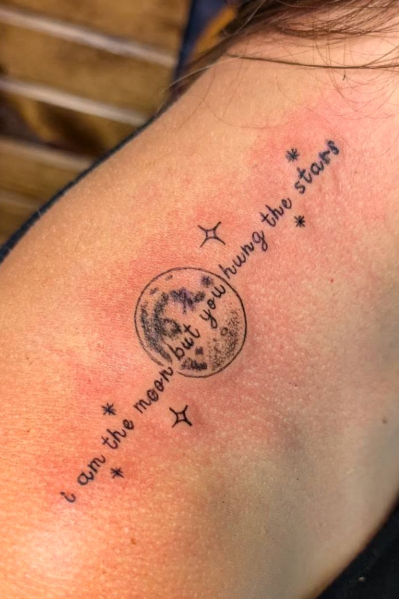A moon and stars quote tattoo