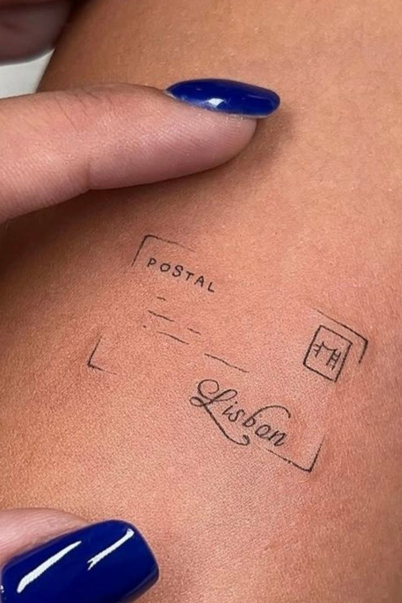 A creative tattoo of a post card