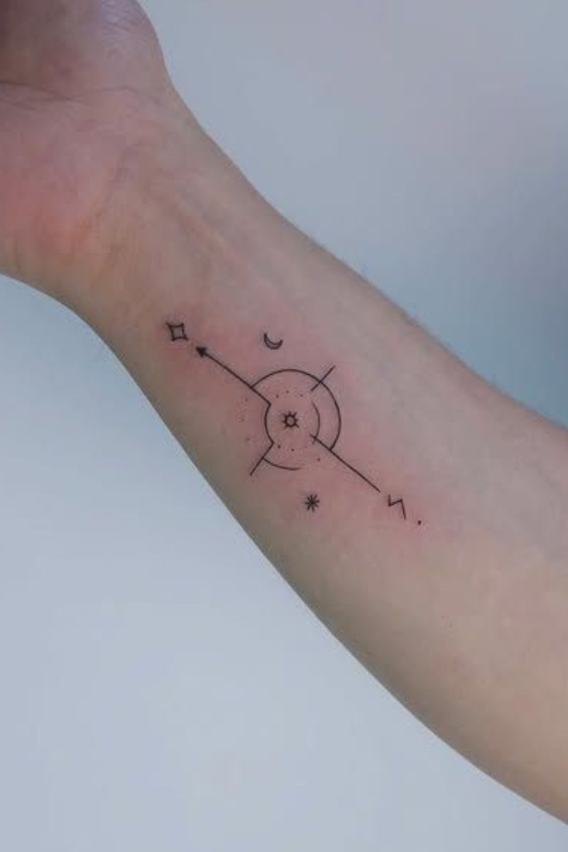 A cosmic linear tattoo on a woman's arm.